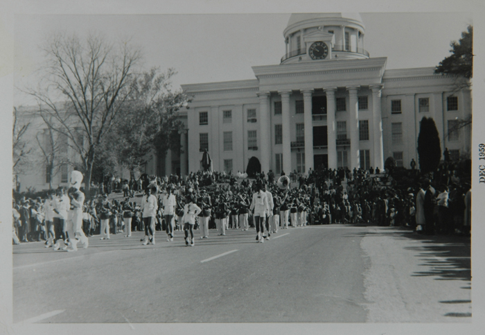The Mighty Bulldog Band of RCTS parade down Dexter Ave. in Montgomery, AL in front of the Alabama Capitol building in 1959 - Aaron Winston - Drum Major